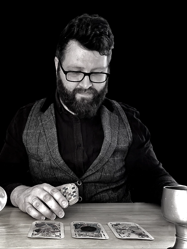 andrew manson performing a collective platform tarot reading